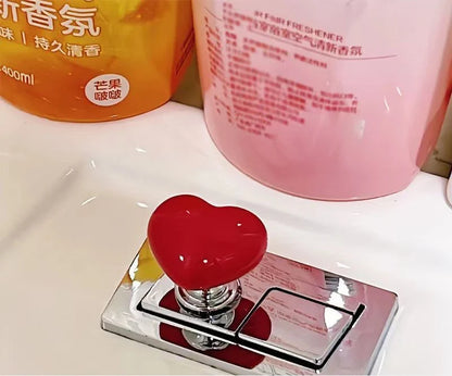 Heart-shaped toilet push button